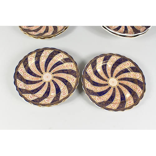 296 - A SET OF  SIX WORCESTER SWIRL PATTERN BLUE AND GILT PLATES. 9 ins diameter and  three deep dishes 9 ... 