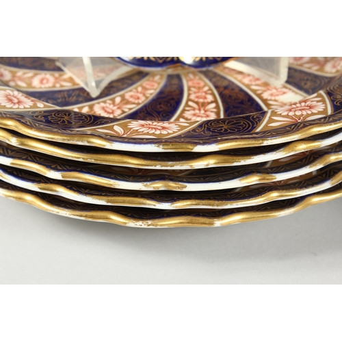 296 - A SET OF  SIX WORCESTER SWIRL PATTERN BLUE AND GILT PLATES. 9 ins diameter and  three deep dishes 9 ... 