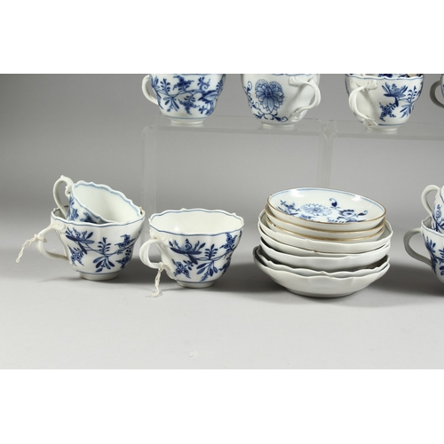 305 - A QUANTITY OF MEISSEN BLUE AND WHITE ONION PATTERN CUPS AND SAUCERS, fifteen various cups and eight ... 