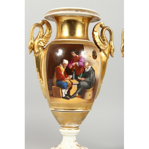 309 - A GOOD PAIR OF EMPIRE TWO HANDLED PORCELAIN VASES with swan handles, reverse painted panels, the Car... 