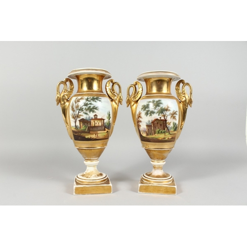 309 - A GOOD PAIR OF EMPIRE TWO HANDLED PORCELAIN VASES with swan handles, reverse painted panels, the Car... 