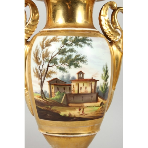 309 - A GOOD PAIR OF EMPIRE TWO HANDLED PORCELAIN VASES with swan handles, reverse painted panels, the Car... 