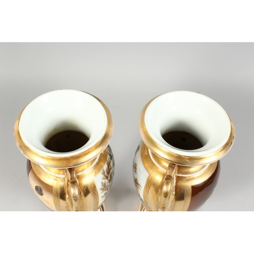 309 - A GOOD PAIR OF EMPIRE TWO HANDLED PORCELAIN VASES with swan handles, reverse painted panels, the Car... 