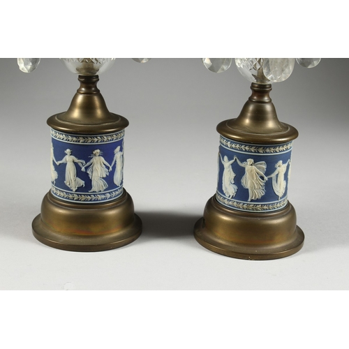 314 - A GOOD PAIR OF WEDGWOOD BLUE AND WHITE LUSTRES with prism drops 11 ins high