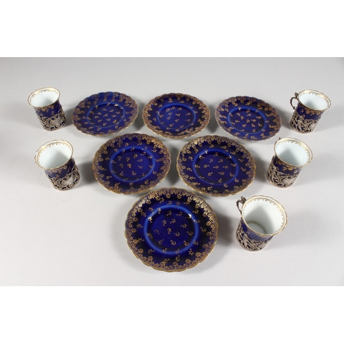 318 - A  SET OF FIVE ROYAL VIENNA BLUE AND GILT CUPS AND SIX SAUCERS with silver handles