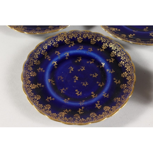 318 - A  SET OF FIVE ROYAL VIENNA BLUE AND GILT CUPS AND SIX SAUCERS with silver handles