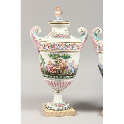 325 - A GOOD PAIR OF CAPODIMONTE URN SHAPED, TWO HANDLED VASES AND COVERS  with classical figures in relie... 