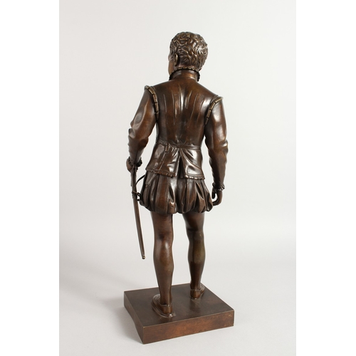 352 - AFTER BARON BOSIO. A FINE BRONZE OF A FRENCH MAN carrying a sword. 19ins high.