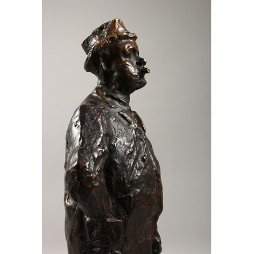 355 - PAOLO TROUBETZKOY (1866-1938) RUSSIAN A CAST BRONZE OF A MAN STANDING HANDS ON HIPS, smoking a cigar... 