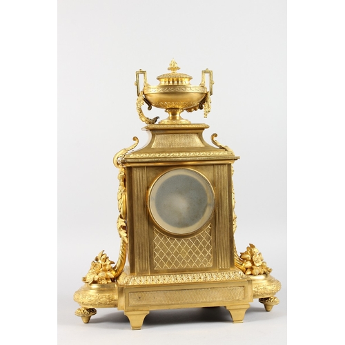 377 - A VERY GOOD LOUIS XVI GILT ORMOLU MANTLE CLOCK, with white enamel dial, blue and white Roman numeral... 