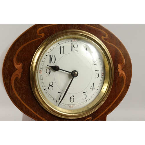 380 - A GOOD EDWARDIAN MAHOGANY BRASS-INLAID BALLOON SHAPED CLOCK. 12ins high.