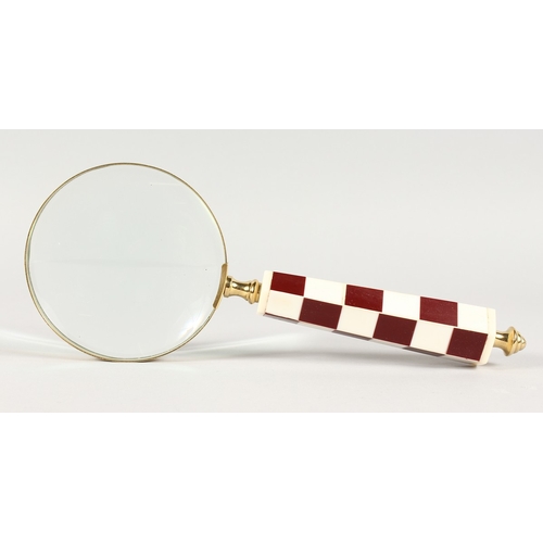 757 - A CHECKERED HANDLED MAGNIFYING GLASS