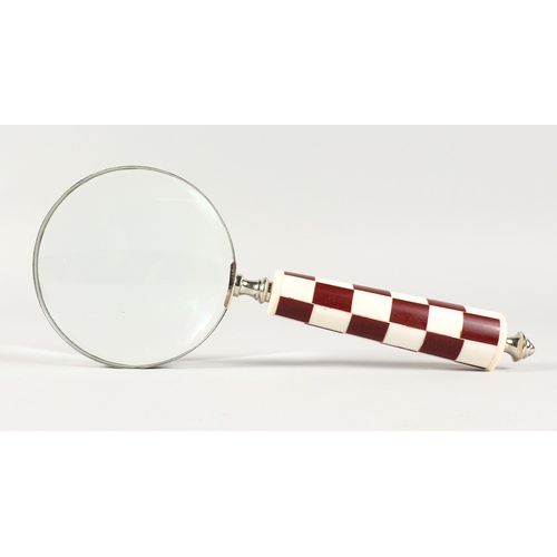 759 - A CHECKERED HANDLED MAGNIFYING GLASS