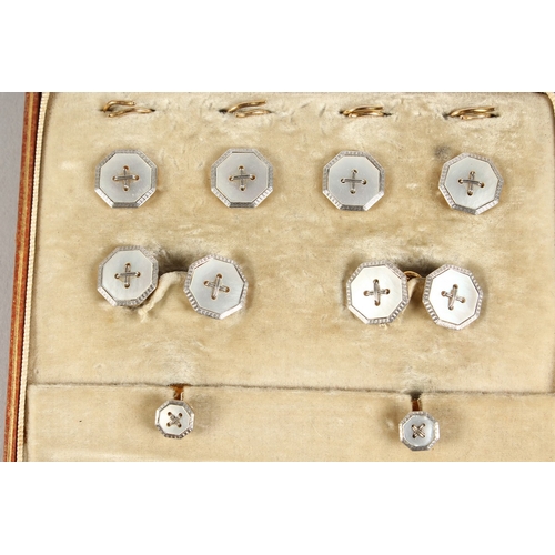 768 - A SET OF  PLATINUM AND MOTHER OF PEARL STUDS AND CUFF LINKS Goldsmith & Silversmith Co. Provenance: ... 