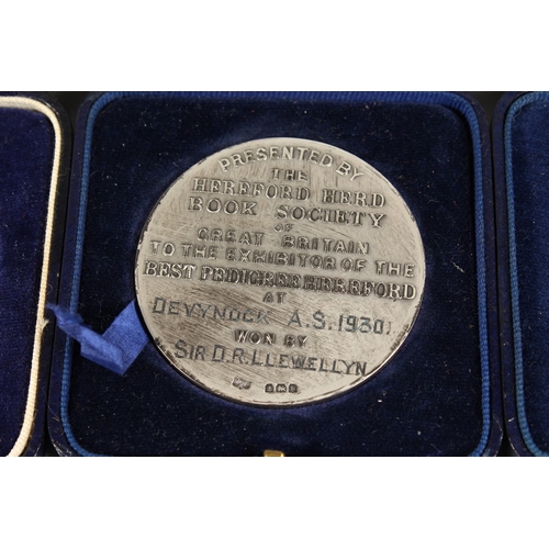 771 - HEREFORD HERD BOOK SOCIETY  THREE SILVER MEDALLIONS won by Sir D.R. Llewellyn, in a Mappin and Webb ... 