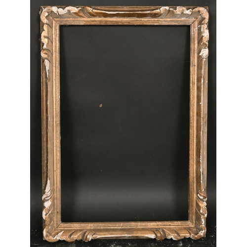 23 - A carved wood frame, rebate size 10.5