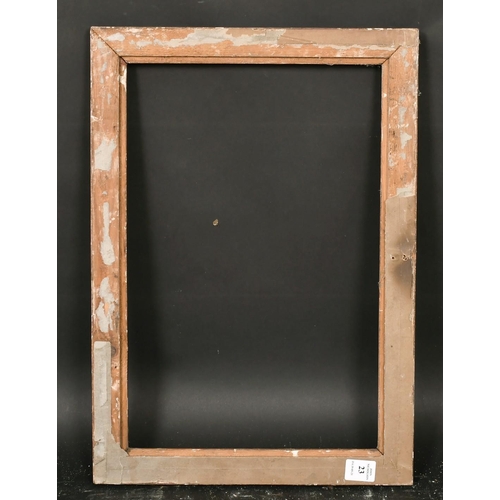 23 - A carved wood frame, rebate size 10.5