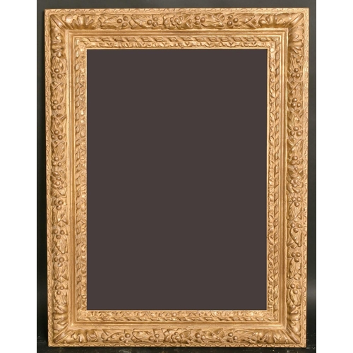 3 - A gilt composition frame with trailing foliage, rebate size, 14.25