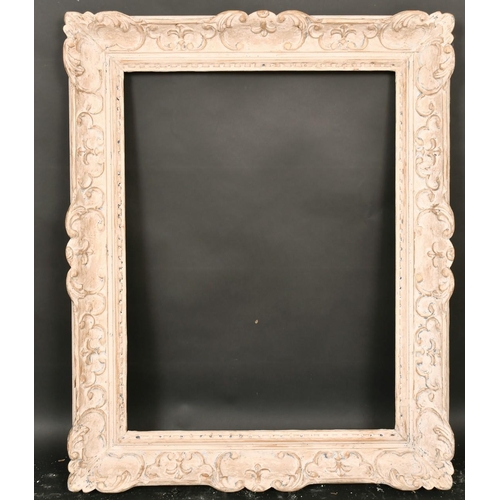 32 - An early 20th century carved wood frame, rebate size 19.5