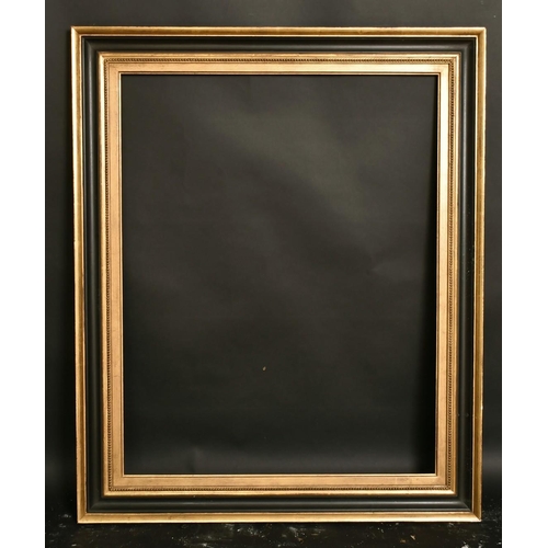 4 - An ebonised and gilt frame, rebate size, 24