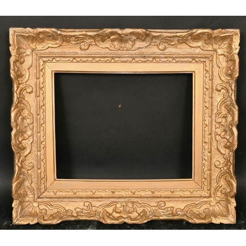 44 - An early 20th century carved wood frame, rebate size 10.5