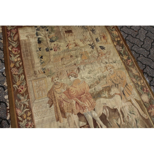 1001 - A GOOD 18TH CENTURY FRENCH TAPESTRY decorated with many figures within a floral border. 6ft high x 4... 