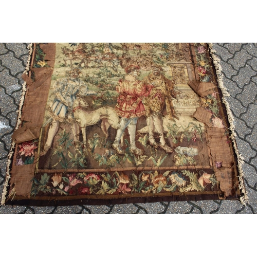 1001 - A GOOD 18TH CENTURY FRENCH TAPESTRY decorated with many figures within a floral border. 6ft high x 4... 