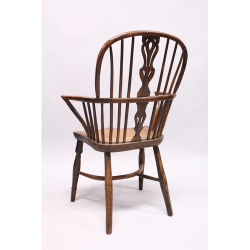 1026 - AN 18TH CENTURY YEW WOOD WINDSOR ARMCHAIR with crinoline stretcher.