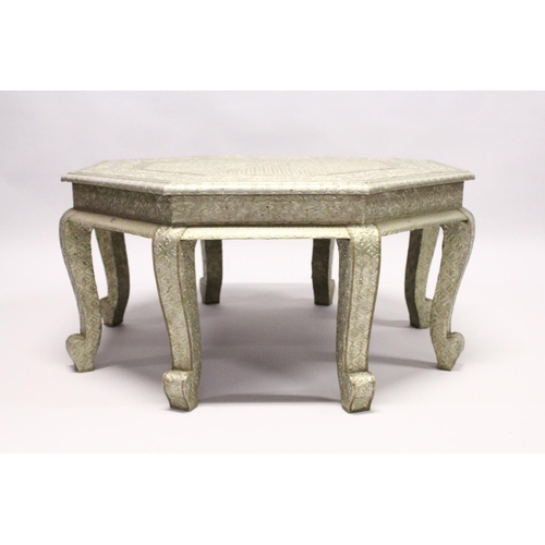 1028 - A 19TH CENTURY INDIAN SILVERED OCTAGONAL COFFEE TABLE on eight curving legs. 3ft diameter, 1ft 6ins ... 