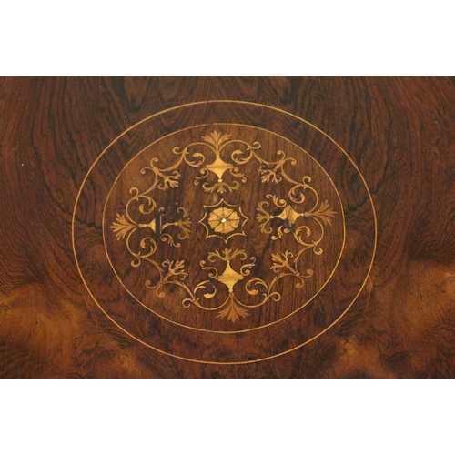 1030 - A GOOD VICTORIAN ROSEWOOD OCTAGONAL CENTRE TABLE with inlaid top, tapering legs with casters and und... 