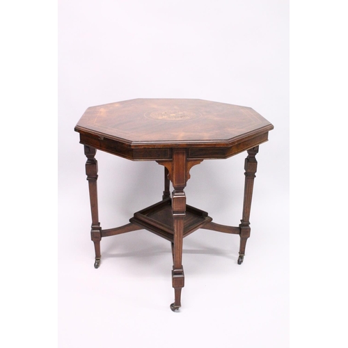 1030 - A GOOD VICTORIAN ROSEWOOD OCTAGONAL CENTRE TABLE with inlaid top, tapering legs with casters and und... 
