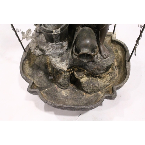 1043 - A FINE BRONZED WATER FEATURE, a classical female and Cupid standing on a metal base and arbour.