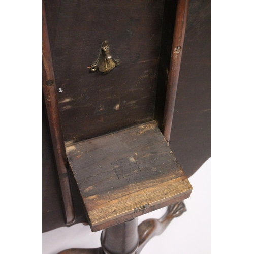 1049 - A CHIPPENDALE STYLE MAHOGANY TILT TOP TABLE with pie crust top, turned support, curving legs with cl... 