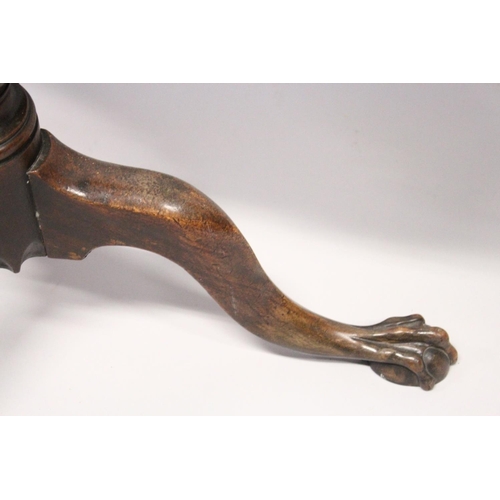 1049 - A CHIPPENDALE STYLE MAHOGANY TILT TOP TABLE with pie crust top, turned support, curving legs with cl... 