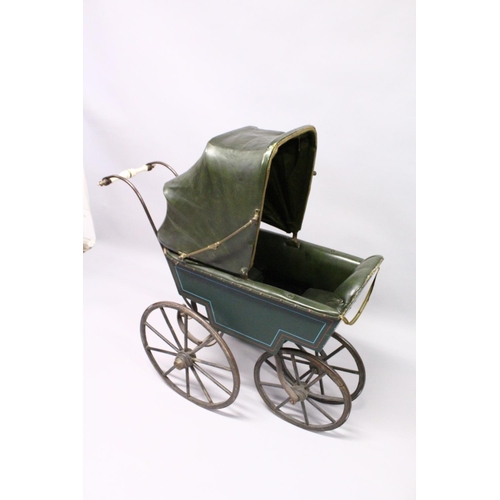 1051 - A RARE VICTORIAN METAL, WOOD AND LEATHER PRAM with folding hood, porcelain handles, wooden wheels. 3... 