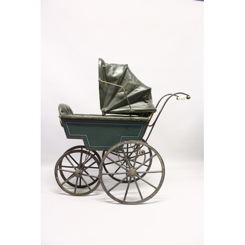 1051 - A RARE VICTORIAN METAL, WOOD AND LEATHER PRAM with folding hood, porcelain handles, wooden wheels. 3... 