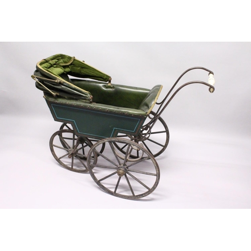 1051 - A RARE VICTORIAN METAL, WOOD AND LEATHER PRAM with folding hood, porcelain handles, wooden wheels. 3... 