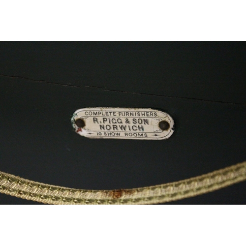 1051 - A RARE VICTORIAN METAL, WOOD AND LEATHER PRAM with folding hood, porcelain handles, wooden wheels. 3... 