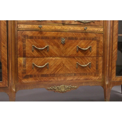 1060 - A GOOD LARGE FRENCH KINGWOOD CABINET, formed as a pair of central marquetry panel doors, over a brus... 