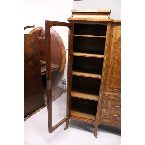 1060 - A GOOD LARGE FRENCH KINGWOOD CABINET, formed as a pair of central marquetry panel doors, over a brus... 