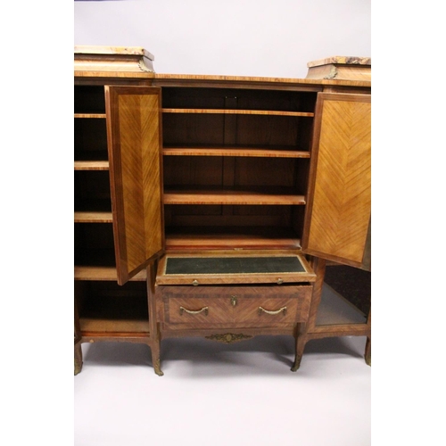 1060 - A GOOD LARGE FRENCH KINGWOOD CABINET, formed as a pair of central marquetry panel doors, over a brus... 