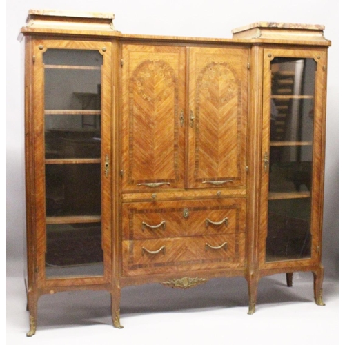 1060 - A GOOD LARGE FRENCH KINGWOOD CABINET, formed as a pair of central marquetry panel doors, over a brus... 