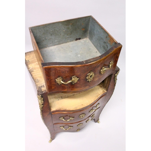 1089 - A LOUIS XV SERPENTINE-FRONTED KINGWOOD PETIT COMMODE with marble top, three drawers with brass handl... 