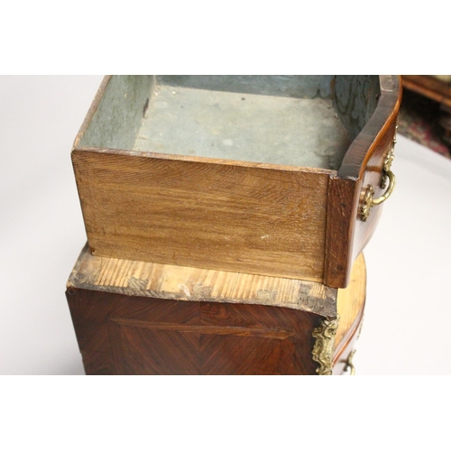 1089 - A LOUIS XV SERPENTINE-FRONTED KINGWOOD PETIT COMMODE with marble top, three drawers with brass handl... 