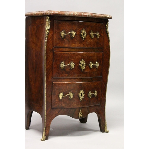 1089 - A LOUIS XV SERPENTINE-FRONTED KINGWOOD PETIT COMMODE with marble top, three drawers with brass handl... 