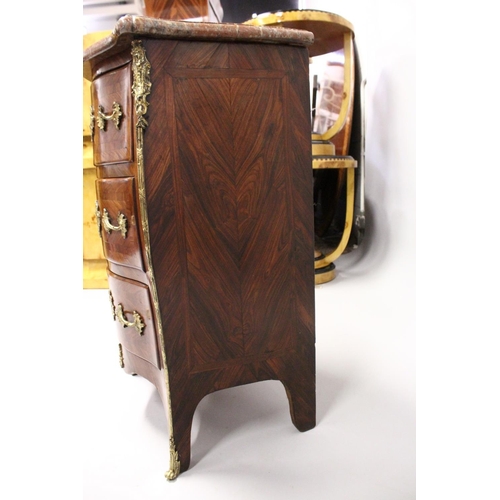1089 - A LOUIS XV SERPENTINE-FRONTED KINGWOOD PETIT COMMODE with marble top, three drawers with brass handl... 