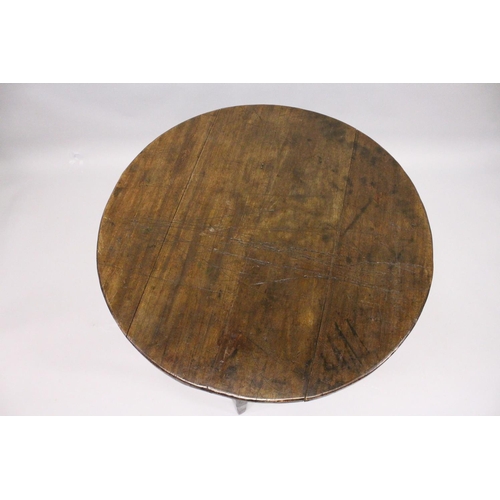 1056 - AN 18TH CENTURY STYLE CRICKET TABLE , the circular top supported on three square legs united by stre... 