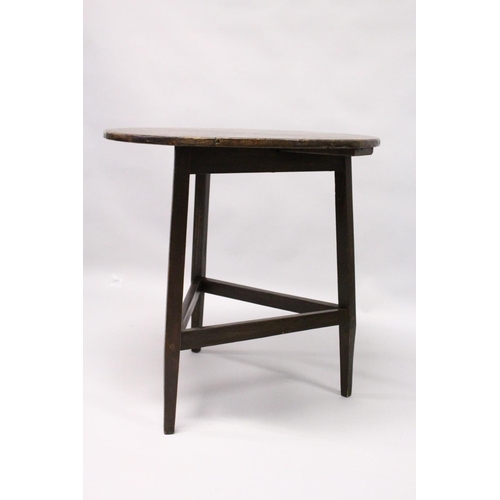 1056 - AN 18TH CENTURY STYLE CRICKET TABLE , the circular top supported on three square legs united by stre... 