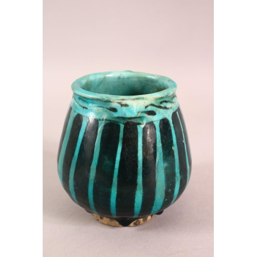 A SMALL RAQQA WARE POSSIBLY 14TH CENTURY TURQUOISE POT, 10cm high ...