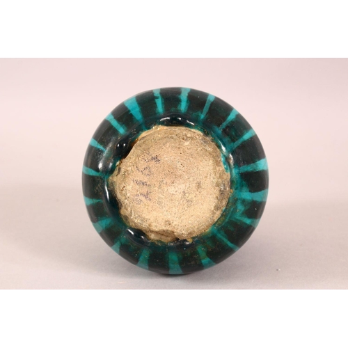 A SMALL RAQQA WARE POSSIBLY 14TH CENTURY TURQUOISE POT, 10cm high ...